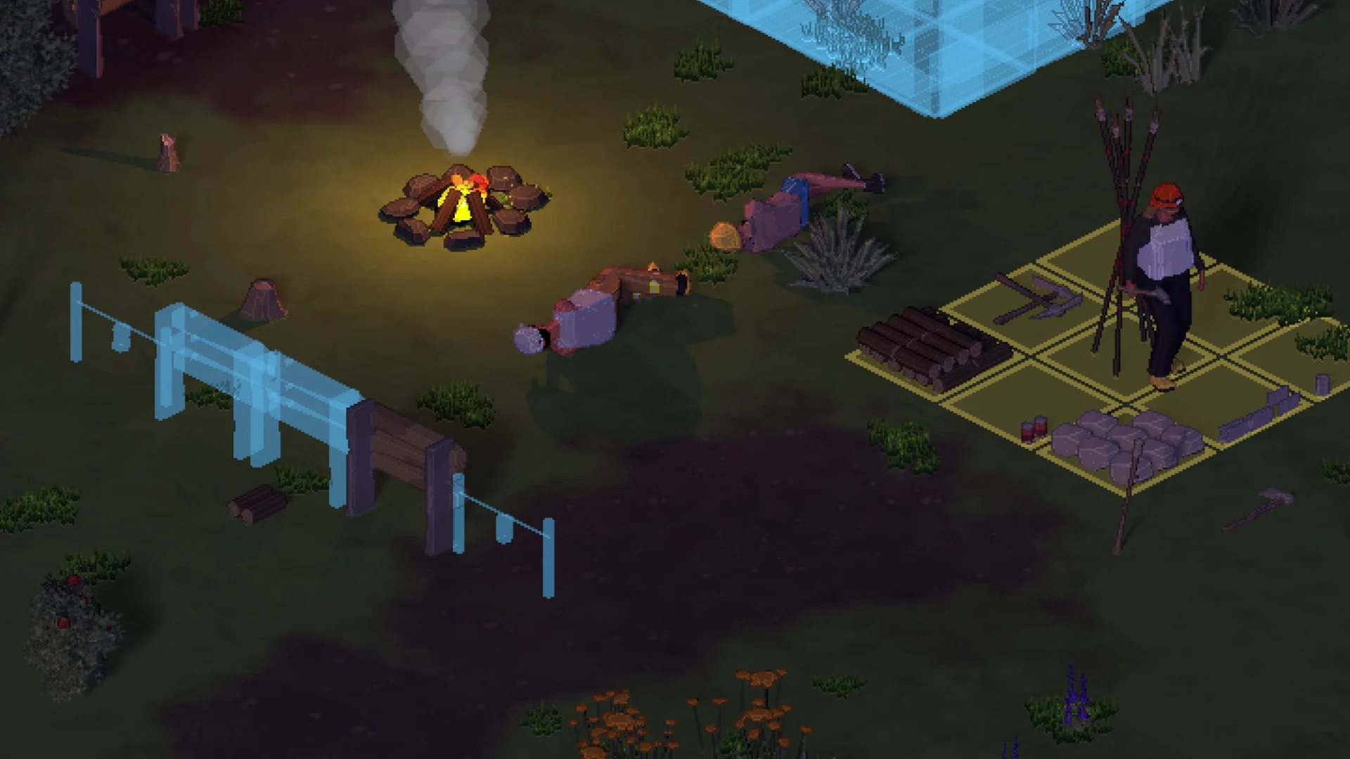 Survivors resting by the fire while their colony takes shape